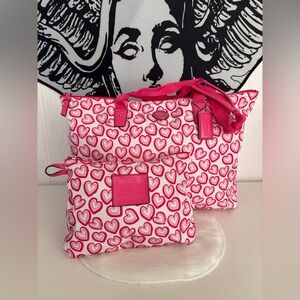 Coach EXTREMELY RARE Getaway Heart Print Weekender tote bag and matching pouch.